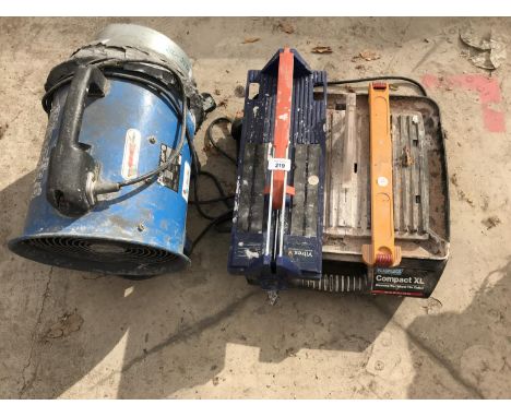 A TILE CUTTER AND SPACE HEATER 