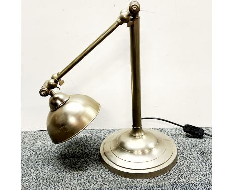 A heavy metal desk lamp, folded H. 41cm.