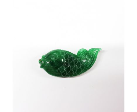 A Chinese carved jade/hardstone amulet of a fish with yellow metal (tested gold) top ring, L. 6cm.