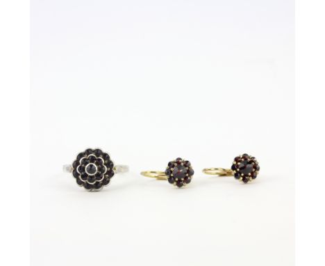A pair of yellow metal garnet cluster earrings together with a white metal garnet cluster ring, (R ).