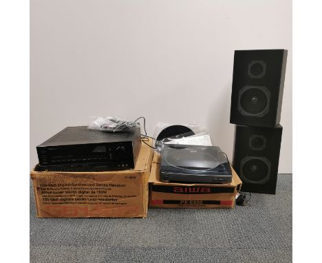 An Aiwa PX-E850 boxed stereo turntable system, a Genexxa STAV-3150 hifi speaker system and a pair of Saisho TCM4500 speakers,