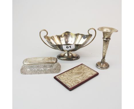 A silver bowl, with a hallmarked silver bud vase (a/f). A silver fronted card case and dressing table item.