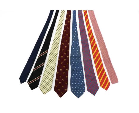 A collection of eight ties, to include: a Christopher Hayes cream ground tie, a Turnbull &amp; Asser blue and white spot tie 