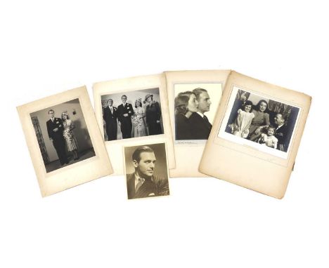 A black and white family photograph of Douglas Fairbanks Jr, Mary Lee and their two daughters22 x 30cma wedding photograph, '