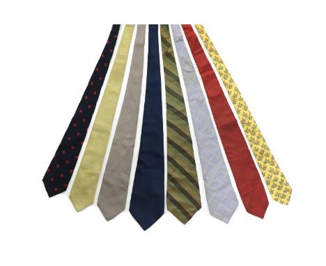 A collection of eight ties,comprising: an Hermès yellow ground tie with a bird and leaf design, a Suka grey silk tie, Turnbul