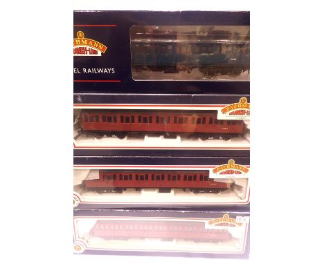 Four Bachmann MK1 Suburban coaches; 34-600, 34-605, 34-676, 34-629A. P&amp;P Group 2 (£18+VAT for the first lot and £3+VAT fo
