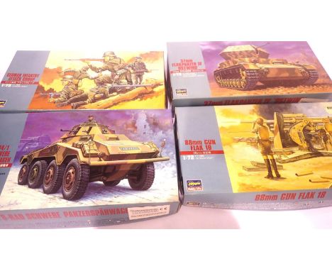 Four Hasegawa 1:72 scale plastic kits, German military vehicles and figures. P&amp;P Group 1 (£14+VAT for the first lot and £