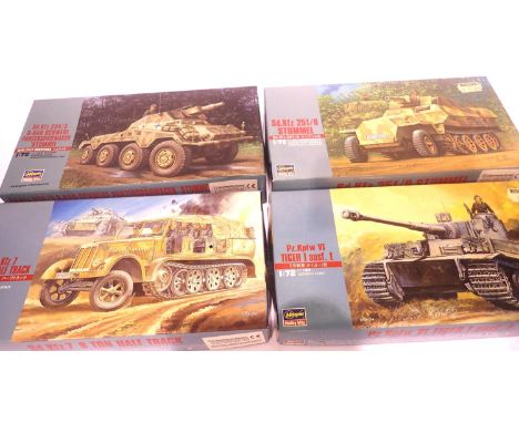 Four Hasegawa 1:72 scale plastic kits, German Military vehicles and figures. P&amp;P Group 1 (£14+VAT for the first lot and £