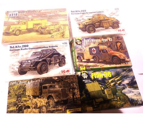 Six military related plastic kits, military wheels, VW type 93, Flak 38, ICM German radio vehicle and light armoured vehicle,