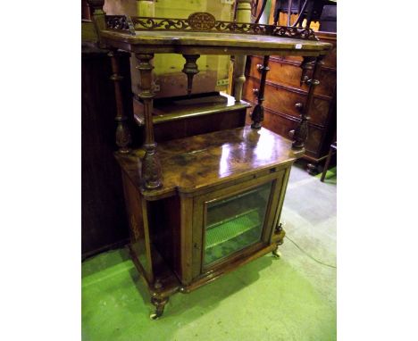 A Victorian walnut whatnot with well matched burr and figured veneers and inlaid floral detail, the upper tier with three qua