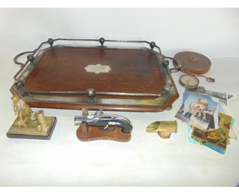 A substantial Victorian oak tray of canted rectangular form with raised ball and bar gallery with looping handles, with vacan