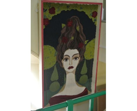 An unusual knitted panel showing a shoulder length portrait of a woman with upswept hair in a garden setting, 124 x 77 cm app
