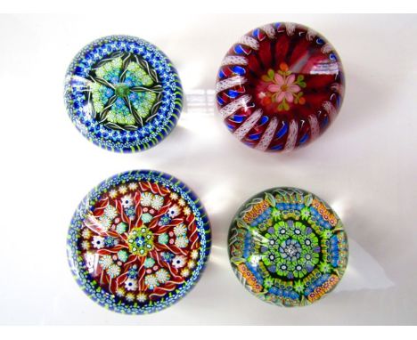 Two boxed Scottish glass Millefiori paperweights by Perthshire to include an example with twisted canes and complicated stars