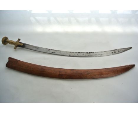 A Talwar, the curved blade stamped Sirohi, with cast brass grip in a leather scabbard