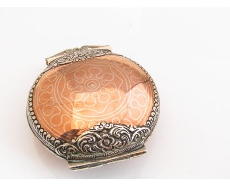 A 19th century copper and white metal overlaid snuff box