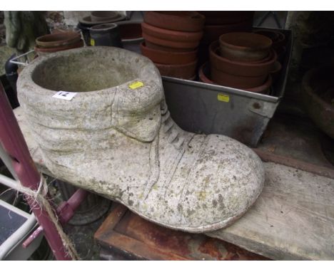 A quantity of mainly reclaimed teracotta flower pots of varying size, a vintage oval galvanised tin bath, a weathered cast co