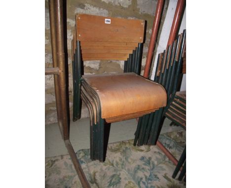 A set of six vintage green painted tubular steel framed child's school stacking chairs with moulded plywood seats and back ra