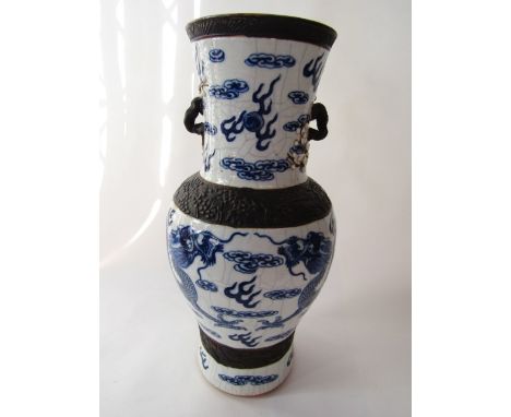 A Chinese crackle glazed baluster shaped vase, with dragon, cloud and pearl detail