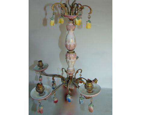 A box containing a ceiling hanging light with ceramic framework, etc