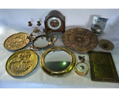 A miscellaneous collection to include brass wares, a brass charger with astrological decoration, candlesticks, a decorative m