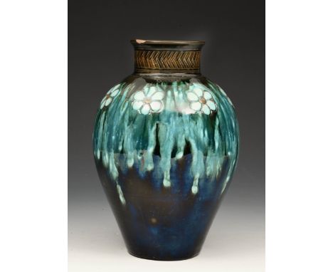 A late 19th century Linthorpe pottery vase of shouldered form, designed by Dr Christopher Dresser, with moulded and painted s