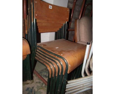 A set of six vintage green painted tubular steel framed child's school stacking chairs with moulded plywood seats and back ra
