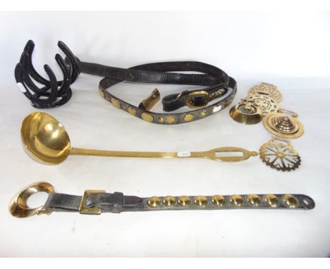 Leather livery with applied brass studs, a graduated three tier letter rack composed from four horseshoes, an antique brass l