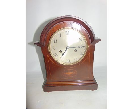 An inlaid Edwardian mahogany bracket clock with silvered dial and 8 day striking movement