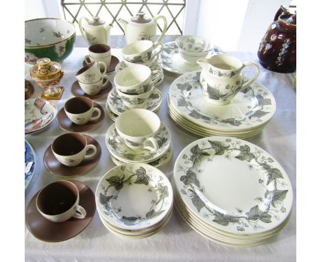 A collection of Wedgwood Napoleon Ivy pattern wares including a milk jug, cake plate, six dinner plates, six side/dessert pla