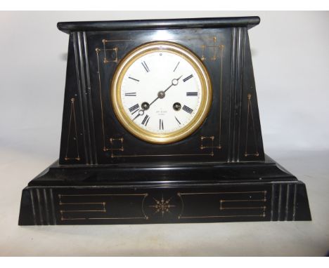 A 19th century black slate mantle clock, the case of tapering architectural form with 8 day striking movement - Henry Marc of