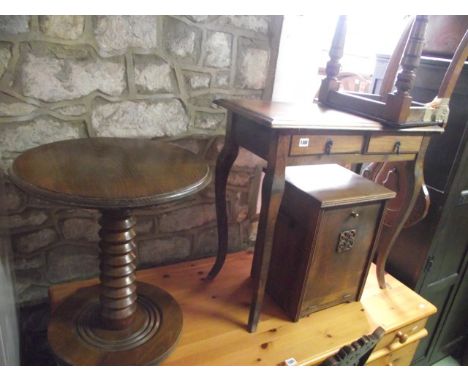 A small stained beechwood side table of rectangular form with moulded outline, two frieze drawers and shaped supports togethe