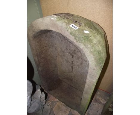 A natural stone trough of rectangular form with single D end, 80 x 50 cm approx
