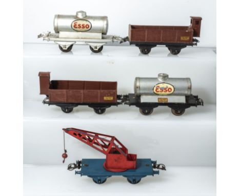 Five French Hornby wagons, two ESSO tanker, two cattle wagons, and a crane wagon