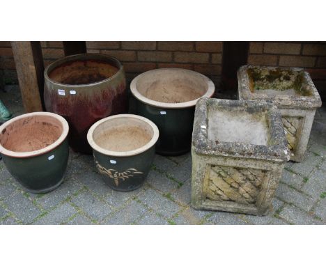 A pair of reconstituted stone square garden planters; together with a large glazed stoneware planter; and three other similar