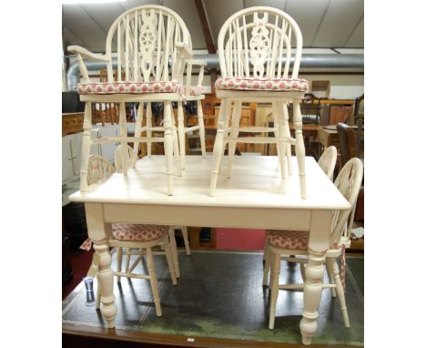 A Victorian style white painted pine round cornered square farmhouse kitchen table, on turned supports, w.128cm; together wit