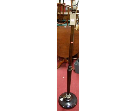 A turned and reeded beech standard lamp
