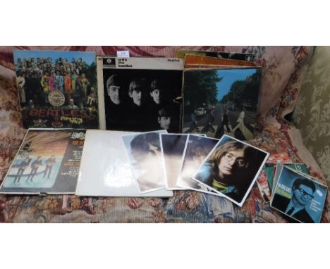 A QUANTITY OF VINTAGE RECORDS including 'The Beatles White Album No. 0296386' with four posters, 'Sgt. Peppers...' and simila