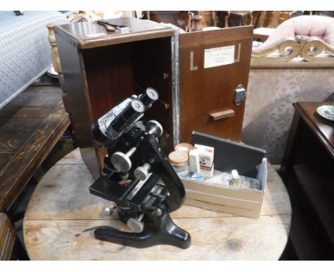 A VINTAGE 'WATSON' MICROSCOPE, in a fitted mahogany case and a collection of Vintage medical jars and accessories 