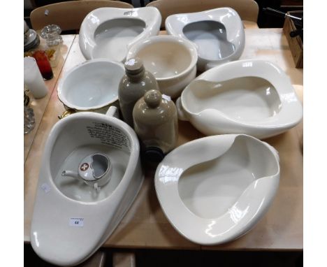 A COLLECTION OF VINTAGE CERAMIC BED PANS, chamber pots and similar items