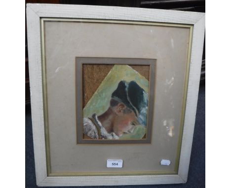 A LATE 19TH CENTURY OIL ON BOARD PORTRAIT OF A BOY WEARING A CAP