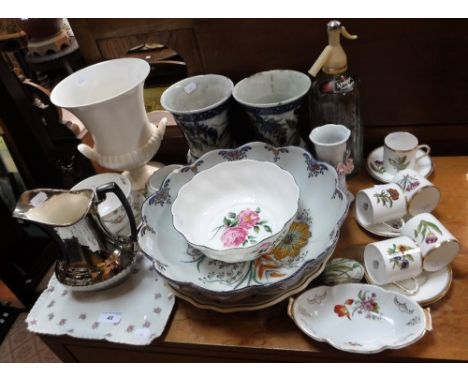 A COLLECTION OF ROYAL WORCESTER 'COFFEE CANS with saucers, decorated with floral specimens and similar ceramics