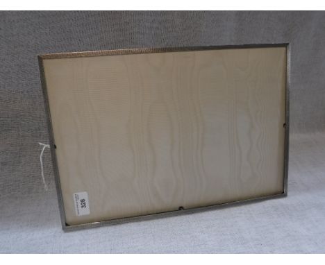 ASPREY & CO: A PHOTOGRAPH FRAME of rectangular panoramic form, with engine-turned decoration, leather back and strut, London 