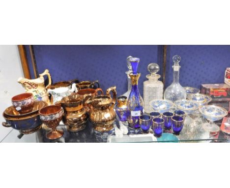 A BLUE GLASS DECANTER with six glasses, other similar glassware, 19th century lustre jugs and other ceramics