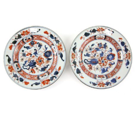 Pair of Chinese Imari Dishes, Kangxi period Circa 1710 painted with flowers and foliage.  23 cm Purchased from Peter Crabbe A