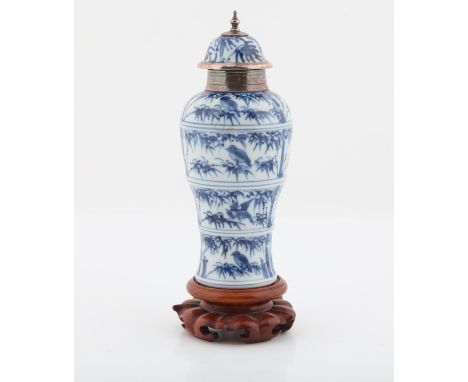 Chinese blue and white vase and cover, Kangxi period or later painted with birds on bamboo branches, and a modern silver gilt