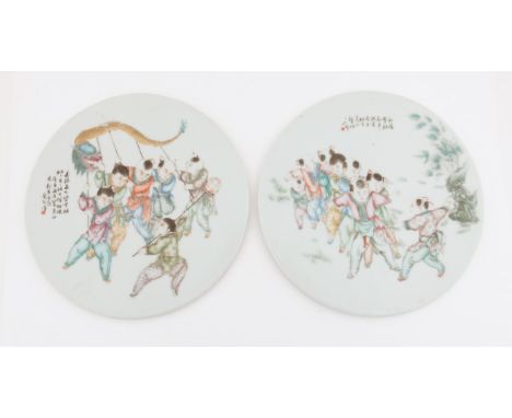 Pair of Chinese Porcelain Plaques Decorated with Children. Republic period, the first  plaque with children playing '' Eagle'