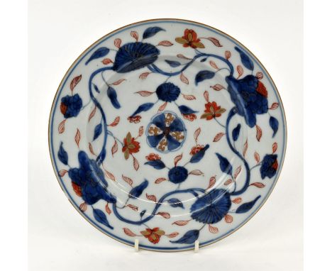 Chinese Imari Dish, Qing dynasty, Kangxi period decorated with polychrome foliate designs throughout in red, blue, and gold, 