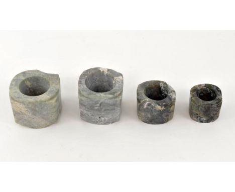 Collection of Jade Cong Liangzhou culture style the four Cong have all of them a square outer section and a circular inner ho