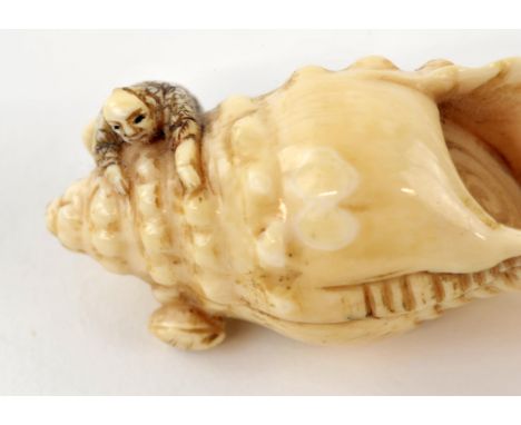 Japanese Netsuke in Ivory of Benkei, Late Edo Period. The hero climbing on a huge conch shell. Signed 5.4cm long 