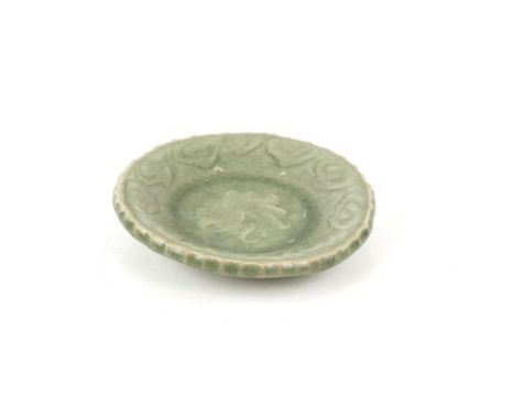A Chinese Longquan Celadon barbed Dish , Early Ming dynasty, the inside on his cavetto incised with a ruyi scroll , and the f